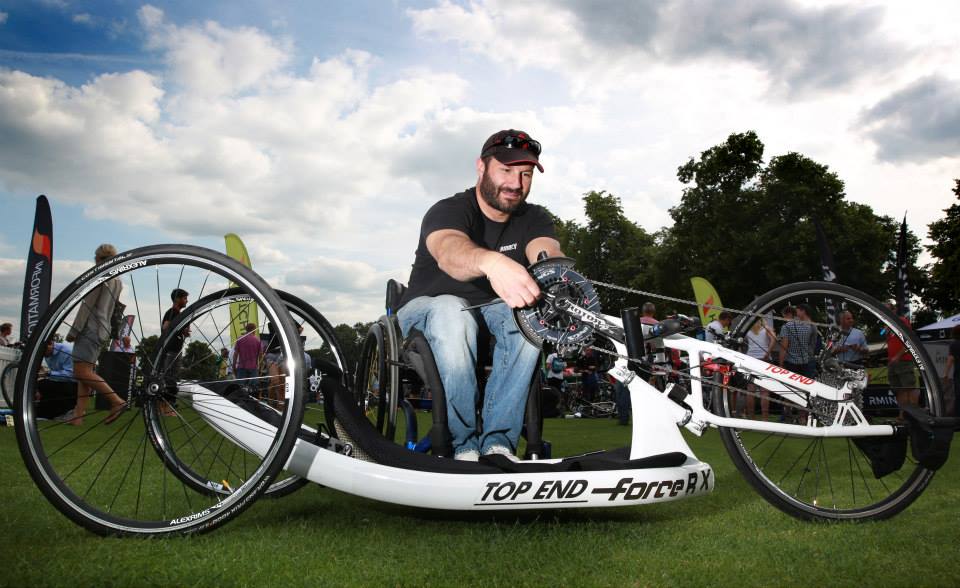 Alan attending to his handcycle before competition