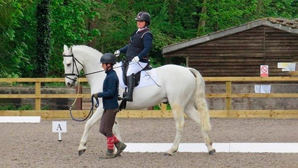 Sallyann Haigh intermittent catheter user riding horse after spinal cord injury