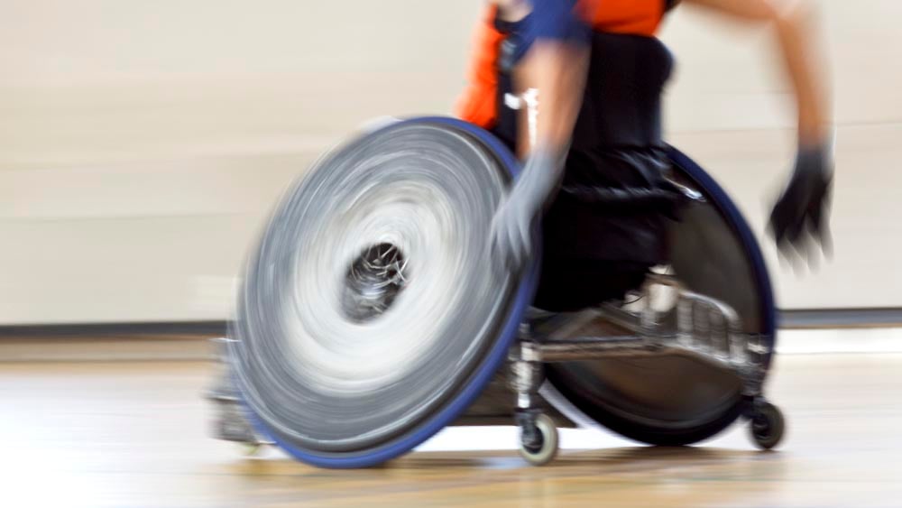 Wheelchair rugby player in motion